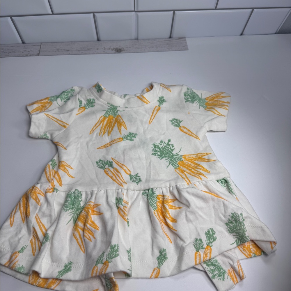 kate quinn Cream Short Sleeve Peplum Top with Orange and Green Carrot Print